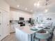Modern kitchen with stainless steel appliances and white cabinetry at 14138 Poppy Field Loop # 4122, Punta Gorda, FL 33955