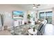 Relaxing living room with comfortable seating and large TV at 14138 Poppy Field Loop # 4122, Punta Gorda, FL 33955
