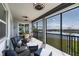 Relaxing screened lanai overlooking a lake, perfect for outdoor living at 14138 Poppy Field Loop # 4122, Punta Gorda, FL 33955