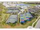 Aerial view of tennis and pickleball courts at 14138 Poppy Field Loop # 4122, Punta Gorda, FL 33955