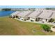 Aerial view of villa community with lake view at 1415 San Cristobal Ave # A4, Punta Gorda, FL 33983