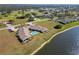 Aerial view of community featuring lake and homes at 1415 San Cristobal Ave # A4, Punta Gorda, FL 33983