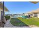 Private backyard with a pool and canal views at 1415 San Cristobal Ave # A4, Punta Gorda, FL 33983