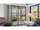 View of backyard pool and patio from sliding glass doors at 1415 San Cristobal Ave # A4, Punta Gorda, FL 33983