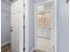 Clean bathroom with white vanity and large mirror at 1415 San Cristobal Ave # A4, Punta Gorda, FL 33983