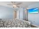 Light and airy bedroom with a king-size bed and en-suite bathroom access at 1415 San Cristobal Ave # A4, Punta Gorda, FL 33983