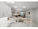 Kitchen with granite island, stainless steel appliances and open concept at 1415 San Cristobal Ave # A4, Punta Gorda, FL 33983