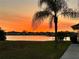 Stunning sunset view over lake from backyard at 1415 San Cristobal Ave # A4, Punta Gorda, FL 33983