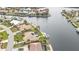 Aerial view of waterfront property, highlighting canal access and a large backyard at 1435 Sea Fan Dr, Punta Gorda, FL 33950