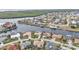 Aerial view showcasing waterfront property and surrounding homes at 1435 Sea Fan Dr, Punta Gorda, FL 33950