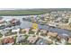 Aerial view of waterfront home with canal access, showcasing a desirable location at 1435 Sea Fan Dr, Punta Gorda, FL 33950