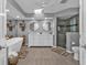 Large bathroom with double vanity, soaking tub and walk-in shower at 1435 Sea Fan Dr, Punta Gorda, FL 33950