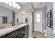 Bathroom with double vanity and shower at 1435 Sea Fan Dr, Punta Gorda, FL 33950