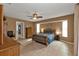 Spacious bedroom with wood flooring and a ceiling fan at 1435 Sea Fan Dr, Punta Gorda, FL 33950