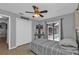 Bedroom with pool view and built in desk at 1435 Sea Fan Dr, Punta Gorda, FL 33950