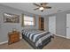 Bedroom with striped bedding and built-in shelving at 1435 Sea Fan Dr, Punta Gorda, FL 33950