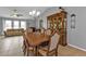 Elegant dining room with a large wooden table and hutch, offering open space at 1435 Sea Fan Dr, Punta Gorda, FL 33950