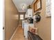 Convenient laundry room with washer, dryer, and additional counter space at 1435 Sea Fan Dr, Punta Gorda, FL 33950