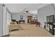 Spacious living room with neutral walls, tiled floors, and ample natural light at 1435 Sea Fan Dr, Punta Gorda, FL 33950
