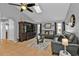 Relaxing living room with vaulted ceiling, leather sofas, and a large entertainment center at 1435 Sea Fan Dr, Punta Gorda, FL 33950