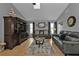 Spacious living room features comfortable seating, a large TV, and plenty of natural light at 1435 Sea Fan Dr, Punta Gorda, FL 33950