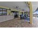 Covered patio with pool access and canal views at 1435 Sea Fan Dr, Punta Gorda, FL 33950