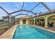 Enclosed pool and patio overlooking the canal at 1435 Sea Fan Dr, Punta Gorda, FL 33950