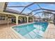 Enclosed pool and patio overlooking the canal at 1435 Sea Fan Dr, Punta Gorda, FL 33950