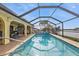 Enclosed pool and patio overlooking the canal at 1435 Sea Fan Dr, Punta Gorda, FL 33950
