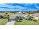 Single-story house with a two car garage and a large yard at 1717 Nuremberg Blvd, Punta Gorda, FL 33983