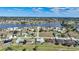 Bird's-eye view of a residential area near a lake at 1717 Nuremberg Blvd, Punta Gorda, FL 33983