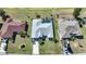 Three houses in a neighborhood, one with a pool at 1717 Nuremberg Blvd, Punta Gorda, FL 33983