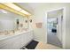 Double vanity bathroom with access to the main bedroom at 1717 Nuremberg Blvd, Punta Gorda, FL 33983
