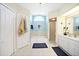 Large bathroom with a bathtub, shower, and double vanity at 1717 Nuremberg Blvd, Punta Gorda, FL 33983