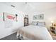 Bright bedroom with a queen-size bed and calming decor at 1717 Nuremberg Blvd, Punta Gorda, FL 33983