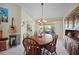 Dining room with a large wooden table and hutch at 1717 Nuremberg Blvd, Punta Gorda, FL 33983