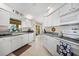 Well-equipped kitchen with white cabinets, ample counter space, and stainless steel appliances at 1717 Nuremberg Blvd, Punta Gorda, FL 33983