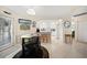 Open concept kitchen with breakfast nook, island, and view into the living area at 1717 Nuremberg Blvd, Punta Gorda, FL 33983