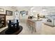 Eat-in kitchen with island, breakfast bar, and access to the exterior at 1717 Nuremberg Blvd, Punta Gorda, FL 33983