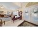 Spacious living room featuring a large sectional sofa and tiled floors at 1717 Nuremberg Blvd, Punta Gorda, FL 33983