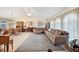 Open living area with a comfortable sectional sofa and dining area at 1717 Nuremberg Blvd, Punta Gorda, FL 33983