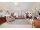 Spacious living area with sectional sofa and access to entryway at 1717 Nuremberg Blvd, Punta Gorda, FL 33983