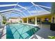 Refreshing screened pool ideal for summer enjoyment at 1717 Nuremberg Blvd, Punta Gorda, FL 33983