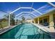 Sparkling screened pool offering a refreshing escape at 1717 Nuremberg Blvd, Punta Gorda, FL 33983