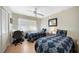 Guest bedroom with two twin beds, desk and access to bathroom at 175 Kings Hwy # 528, Punta Gorda, FL 33983