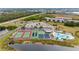 Community features tennis courts, pool, and lush landscaping at 175 Kings Hwy # 528, Punta Gorda, FL 33983