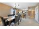 Dining area with table and chairs, adjacent to kitchen at 175 Kings Hwy # 528, Punta Gorda, FL 33983