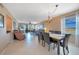Bright dining room with table and chairs, open to living area at 175 Kings Hwy # 528, Punta Gorda, FL 33983
