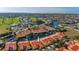 Aerial showing home location in community by golf course and water at 1780 Deborah Dr # 15, Punta Gorda, FL 33950