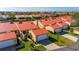 Aerial view of community showing home's location, landscape, and canal at 1780 Deborah Dr # 15, Punta Gorda, FL 33950